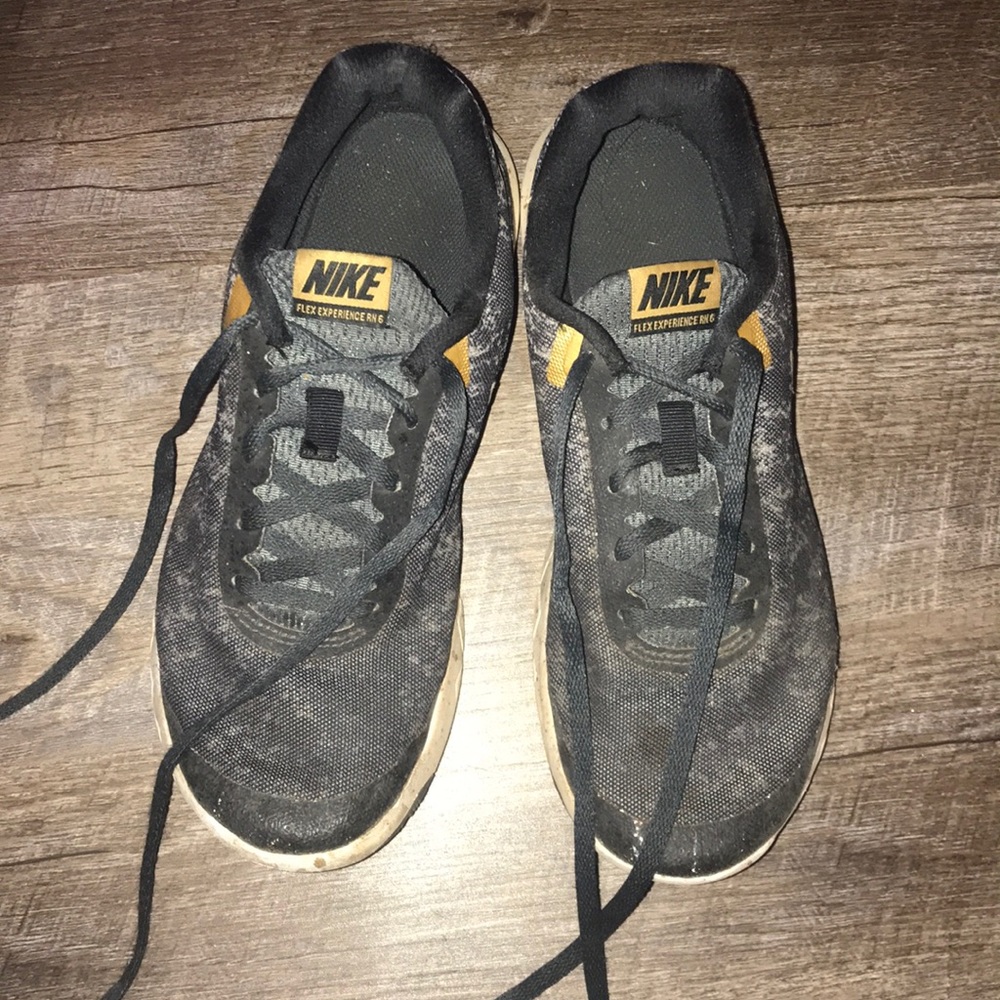 Black and Gold Nike Tennis Shoes